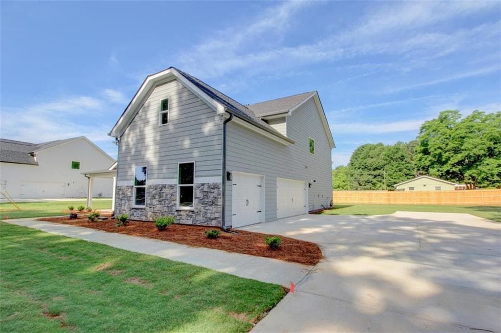 5 bedroom, 4 bathroom, 3,476 sq ft single family residence for sale at 41 Woodland Road, Covington, GA 30016 — photo 3