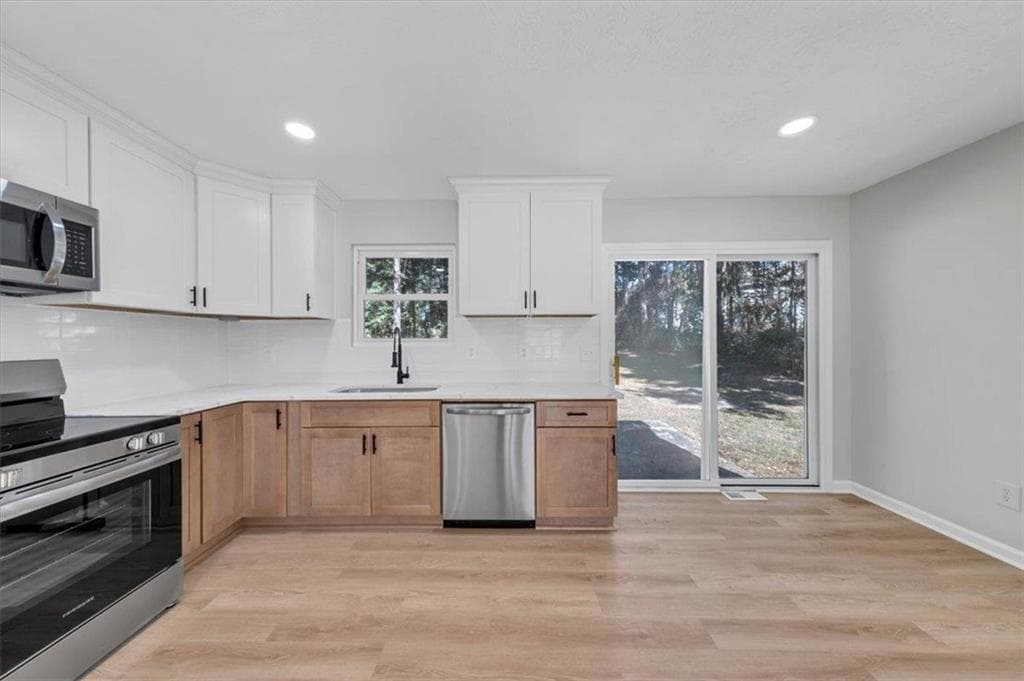 3 bedroom, 2 bathroom, 1,534 sq ft single family residence for sale at 7977 Flanders Ct, Jonesboro, GA 30238 — photo 9