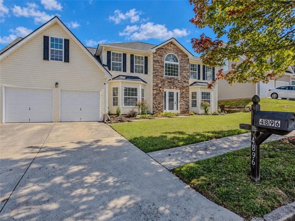 5 bedroom, 3 bathroom, 2,974 sq ft home for sale at 4896 Laythan Jace Court, Snellville, GA