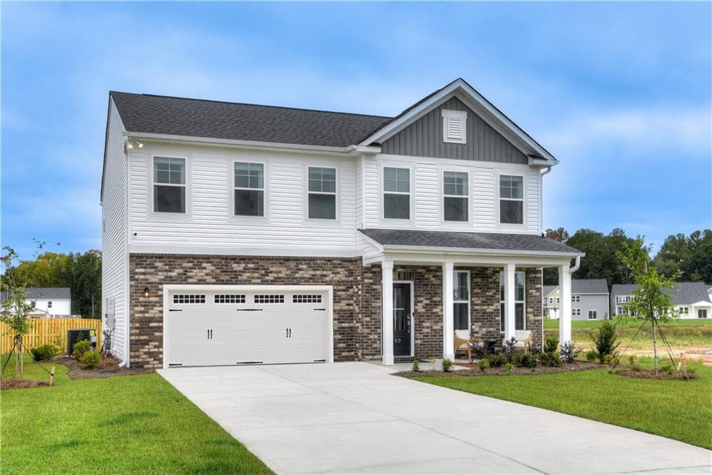 5 bedroom, 3 bathroom, 2,686 sq ft single family residence for sale at 748 Ocmulgee Crossing, Locust Grove, GA 30248 — photo 2