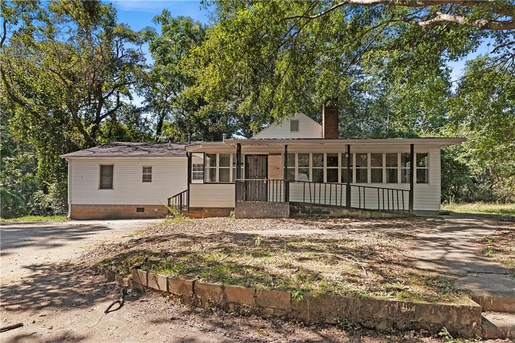 5 bedroom, 2 bathroom, 2,061 sq ft home for sale at 1067 Constitution Road, Atlanta, GA