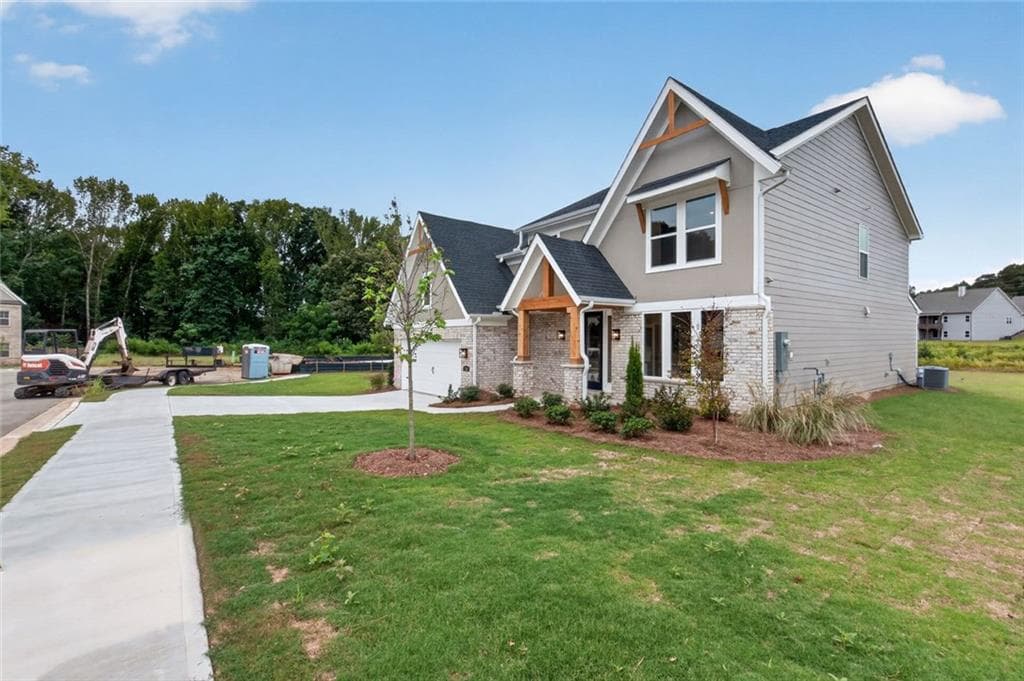 4 bedroom, 3 bathroom, 3,086 sq ft single family residence for sale at 320 Cherokee Rose Lane, Hoschton, GA 30548 — photo 5