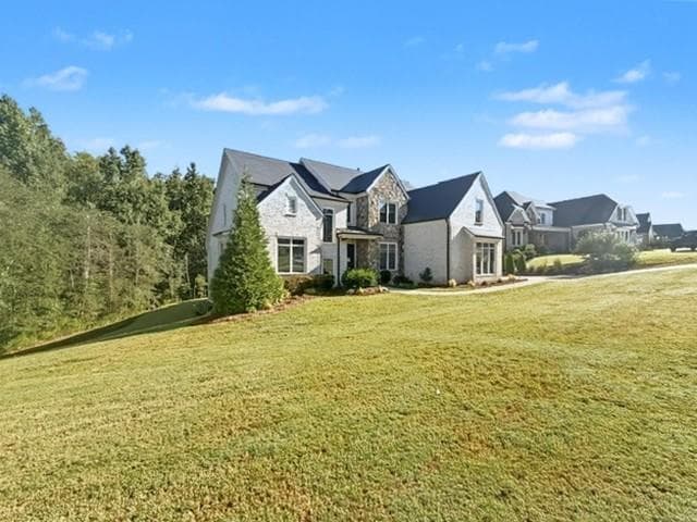 6 bedroom, 7 bathroom, 6,468 sq ft single family residence for sale at 5760 Lula Bridge Court, Braselton, GA 30517 — photo 2