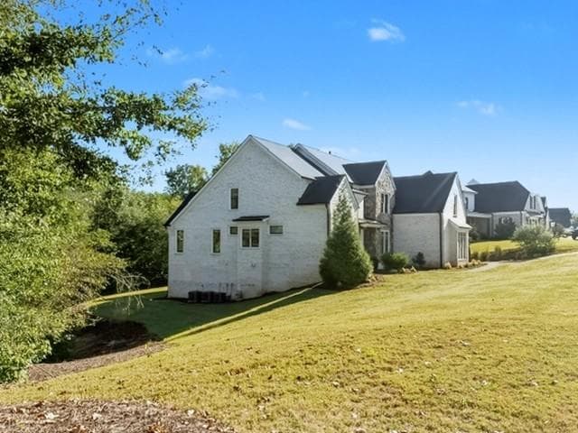 6 bedroom, 7 bathroom, 6,468 sq ft single family residence for sale at 5760 Lula Bridge Court, Braselton, GA 30517 — photo 3