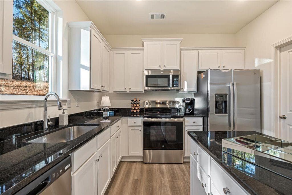 3 bedroom, 3 bathroom, 1,745 sq ft townhouse for sale at 2562 RIVERSIDE Road, Conyers, GA 30013 — photo 2