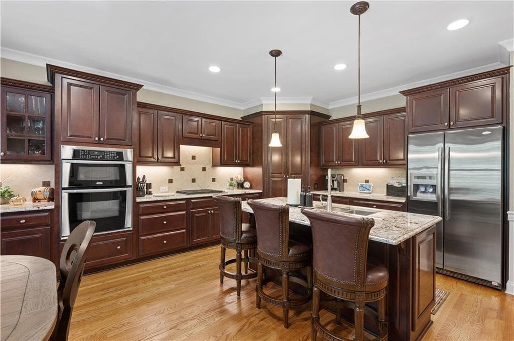 4 bedroom, 4 bathroom, 3,176 sq ft townhouse for sale at 5505 Waters Edge Trail, Roswell, GA 30075 — photo 4