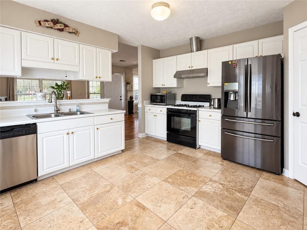 3 bedroom, 2 bathroom, 1,637 sq ft single family residence for sale at 4499 Creek Ford Drive, Duluth, GA 30096 — photo 5