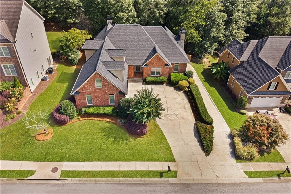 4 bedroom, 5 bathroom, 6,198 sq ft single family residence for sale at 2065 Democracy Drive, Buford, GA 30519 — photo 2