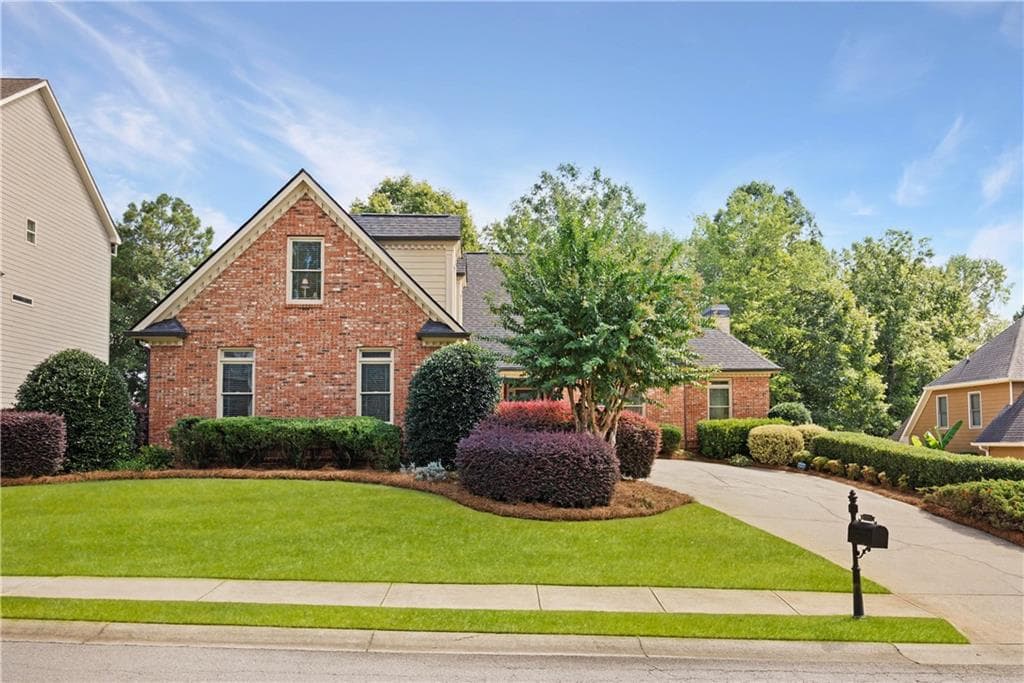4 bedroom, 5 bathroom, 6,198 sq ft single family residence for sale at 2065 Democracy Drive, Buford, GA 30519 — photo 4