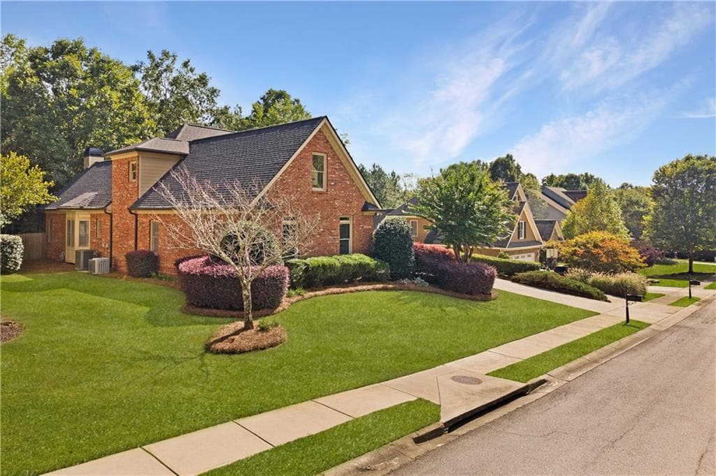 4 bedroom, 5 bathroom, 6,198 sq ft single family residence for sale at 2065 Democracy Drive, Buford, GA 30519 — photo 5