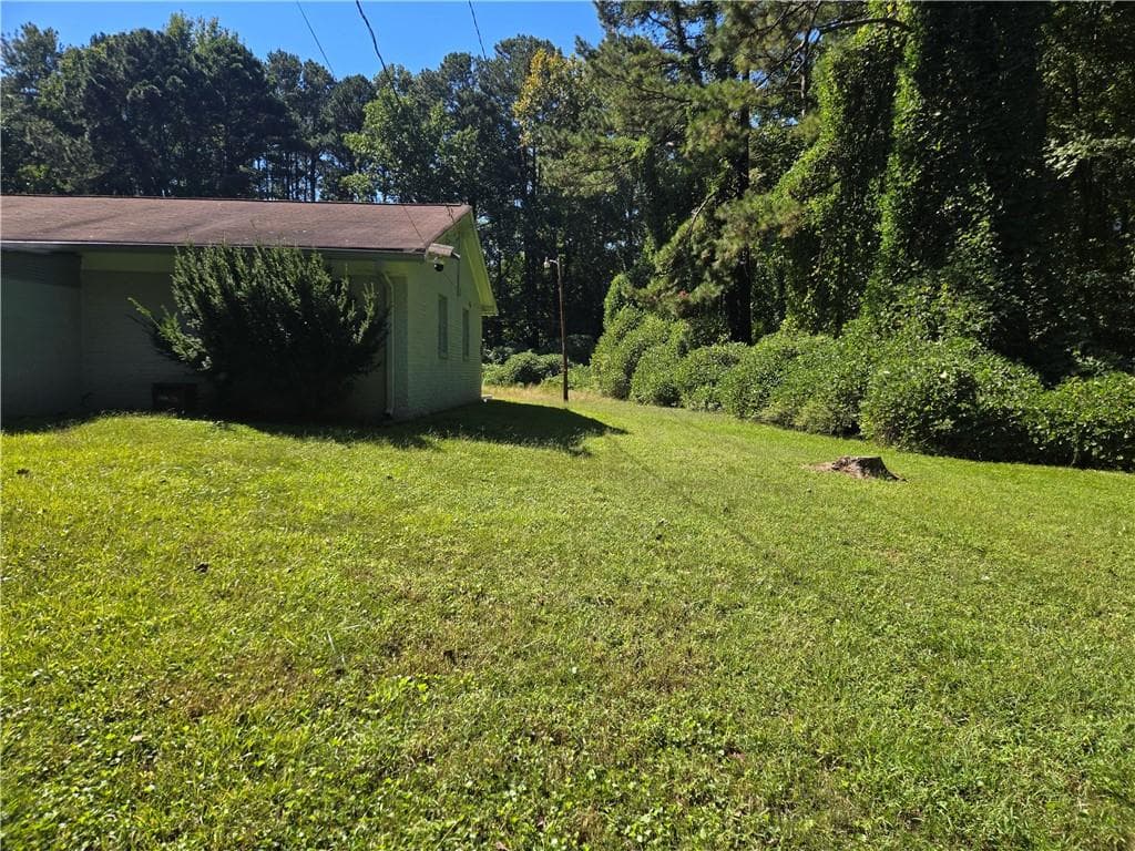 3 bedroom, 2 bathroom, 2,280 sq ft single family residence for sale at 4431 Janice Drive, College Park, GA 30337 — photo 3