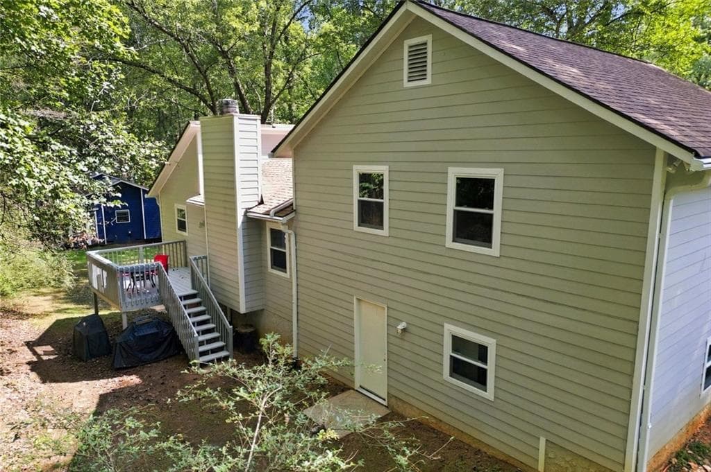 4 bedroom, 2 bathroom, 2,348 sq ft single family residence for sale at 5024 Gunners, Roswell, GA 30075 — photo 4