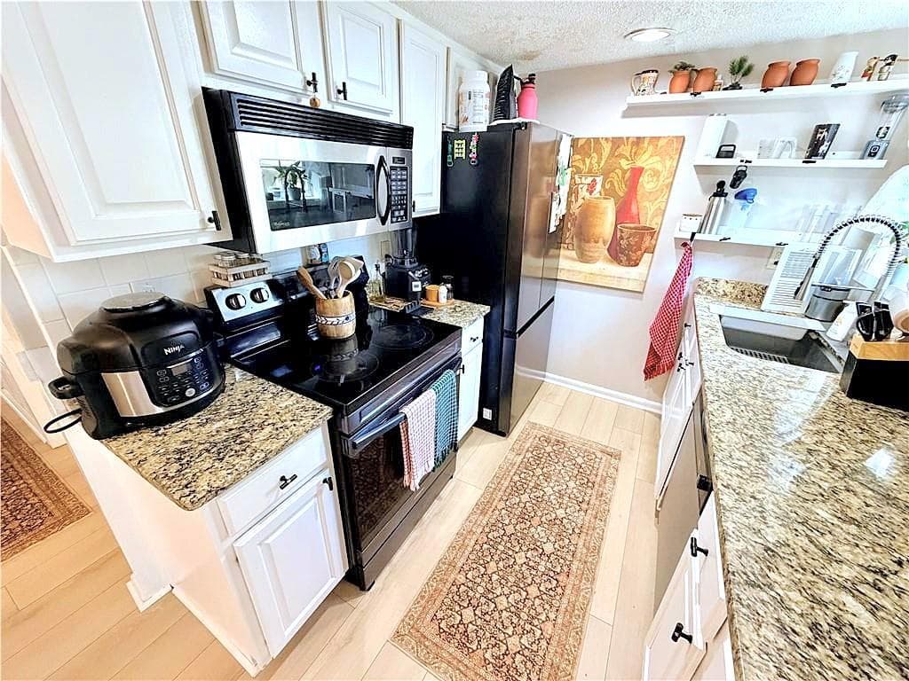 3 bedroom, 3 bathroom, 1,434 sq ft townhouse for sale at 6900 Roswell Road 1K, Sandy Springs, GA 30328 — photo 7