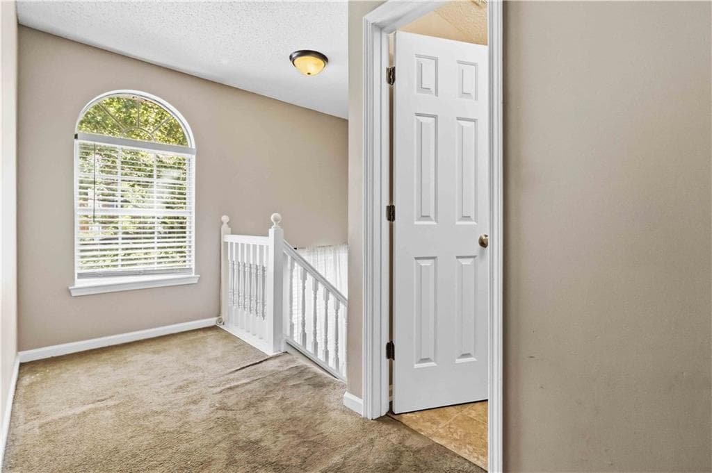 4 bedroom, 3 bathroom, 1,940 sq ft single family residence for sale at 2608 Micah Drive, Ellenwood, GA 30294 — photo 8
