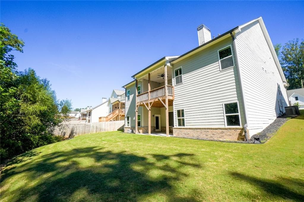 4 bedroom, 3 bathroom single family residence for sale at 1880 Grand Lanier Drive, Buford, GA 30518 — photo 2