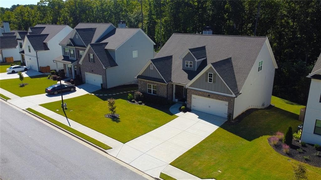 4 bedroom, 3 bathroom single family residence for sale at 1880 Grand Lanier Drive, Buford, GA 30518 — photo 3