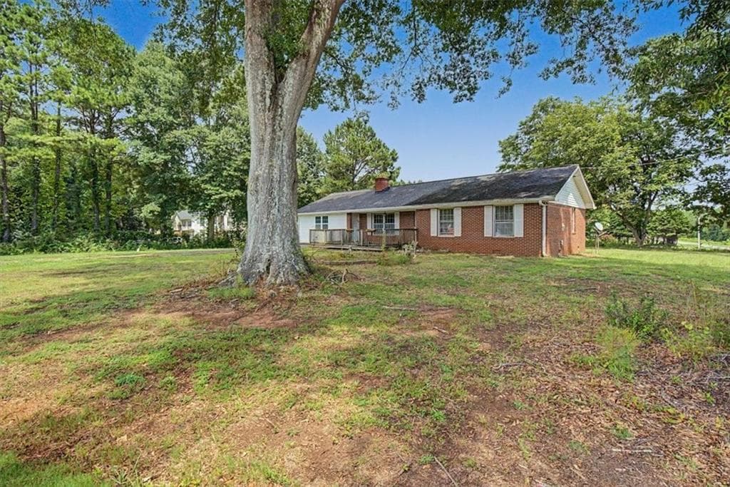 4 bedroom, 3 bathroom, 1,632 sq ft single family residence for sale at 5735 Burnt Hickory Road, Powder Springs, GA 30127