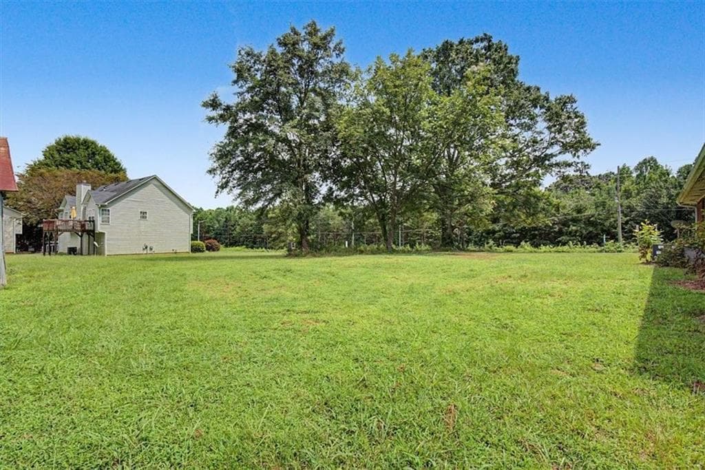 4 bedroom, 3 bathroom, 1,632 sq ft single family residence for sale at 5735 Burnt Hickory Road, Powder Springs, GA 30127 — photo 5