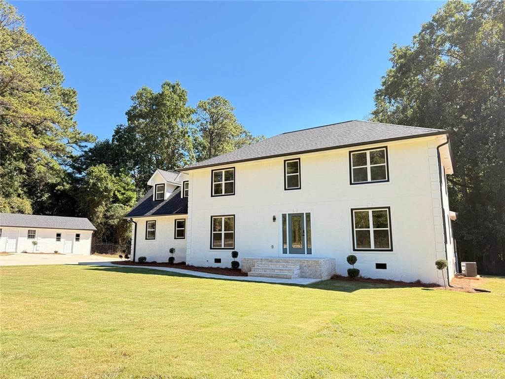 4 bedroom, 3 bathroom, 3,140 sq ft single family residence for sale at 2887 Lake Jodeco Road, Jonesboro, GA 30236 — photo 3