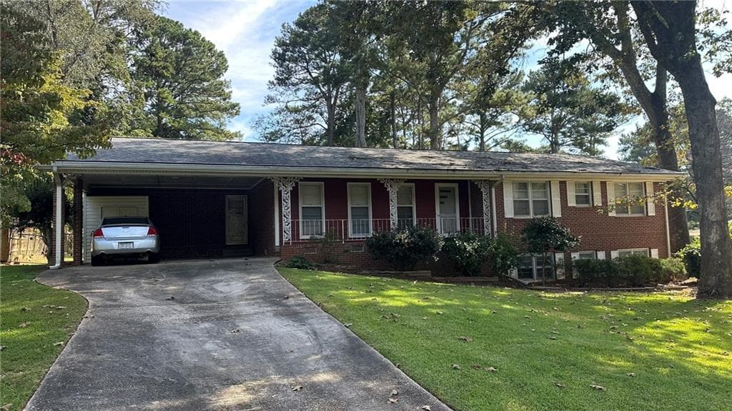 3 bedroom, 2 bathroom, 1,516 sq ft single family residence for sale at 5574 Laurel Lane, Lilburn, GA 30047