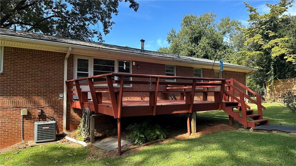 3 bedroom, 2 bathroom, 1,516 sq ft single family residence for sale at 5574 Laurel Lane, Lilburn, GA 30047 — photo 6
