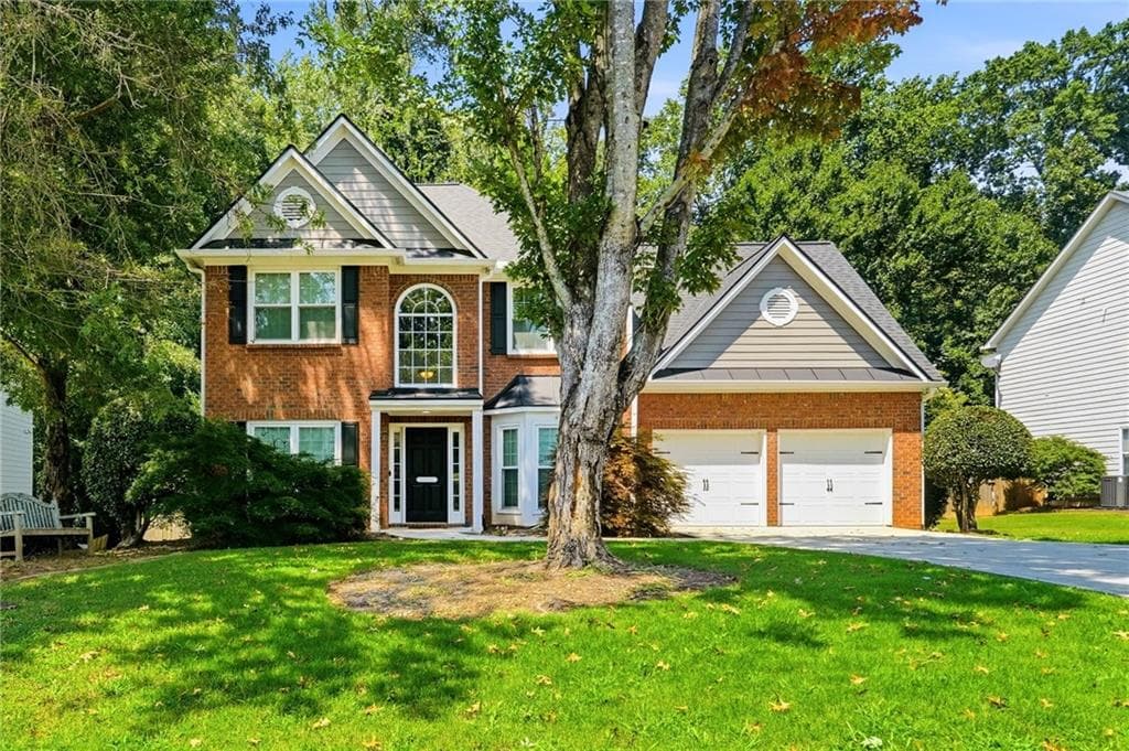 3 bedroom, 3 bathroom, 2,010 sq ft single family residence for sale at 575 Kingsport Drive, Roswell, GA 30076 — photo 2