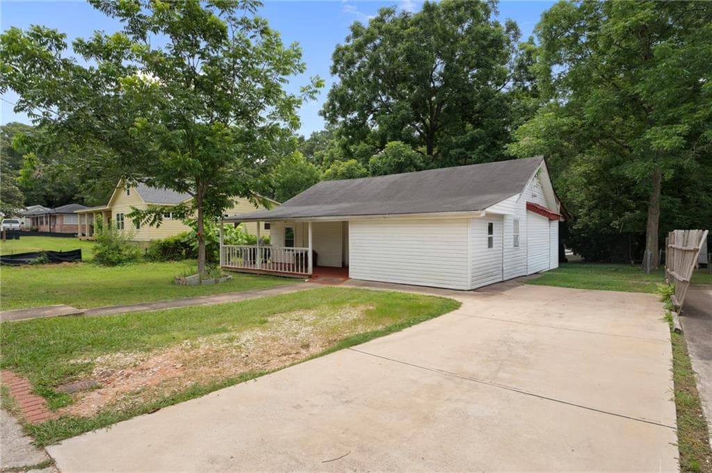 5 bedroom, 3 bathroom, 1,160 sq ft single family residence for sale at 123 South Avenue, Jonesboro, GA 30236 — photo 4