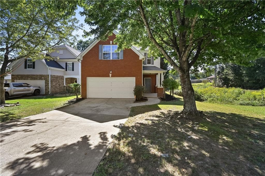 4 bedroom, 3 bathroom, 1,828 sq ft single family residence for sale at 2698 Whistle Stop Drive, Norcross, GA 30071 — photo 2
