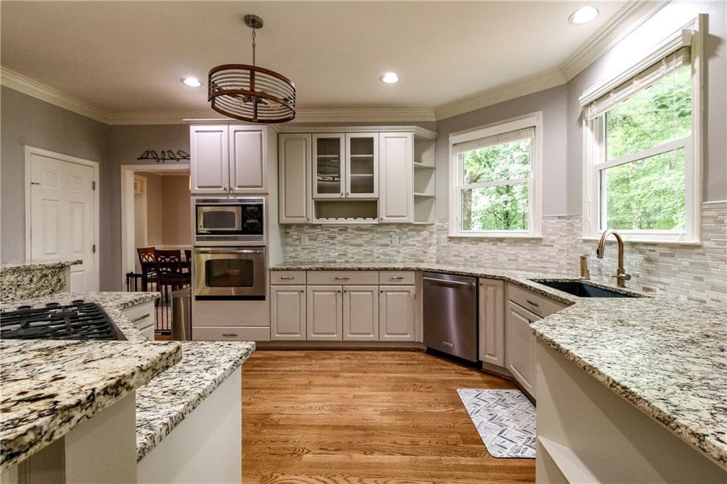 5 bedroom, 4 bathroom, 5,264 sq ft single family residence for sale at 656 Goldenwood Court, Powder Springs, GA 30127 — photo 3