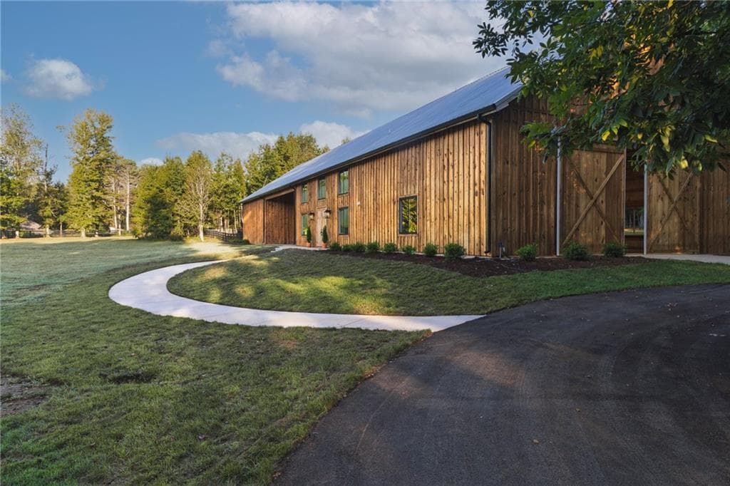 4 bedroom, 2 bathroom, 2,376 sq ft single family residence for sale at 2907 Hightower Road, Ball Ground, GA 30107 — photo 2
