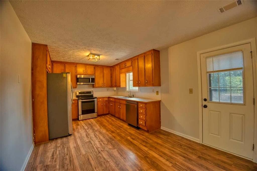 5 bedroom, 2 bathroom, 1,848 sq ft single family residence for sale at 928 Hi Hope Road, Lawrenceville, GA 30043 — photo 8