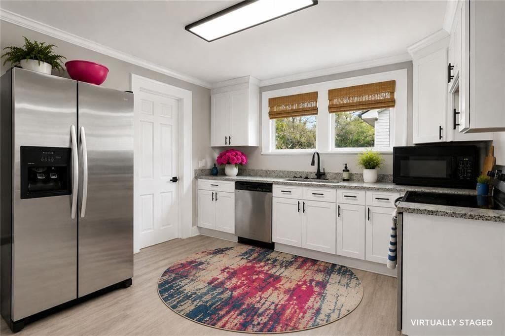 3 bedroom, 1 bathroom, 1,110 sq ft single family residence for sale at 1409 St Michael Avenue, East Point, GA 30344 — photo 2