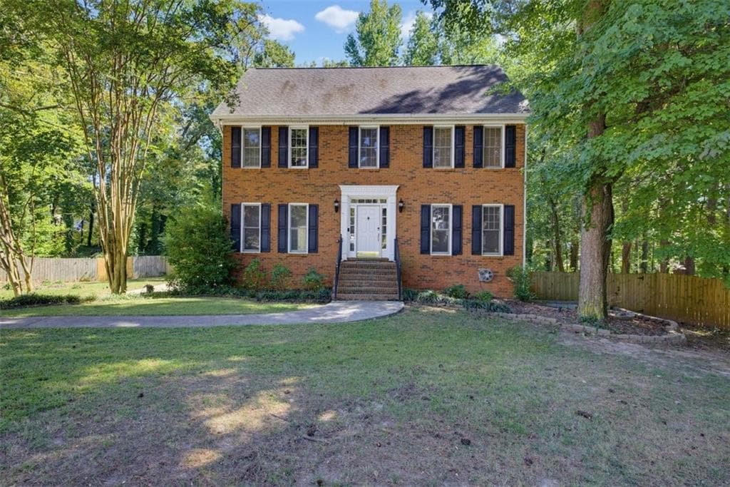 4 bedroom, 3 bathroom, 2,966 sq ft single family residence for sale at 2711 Lochraven Court, Snellville, GA 30039 — photo 1 of 53