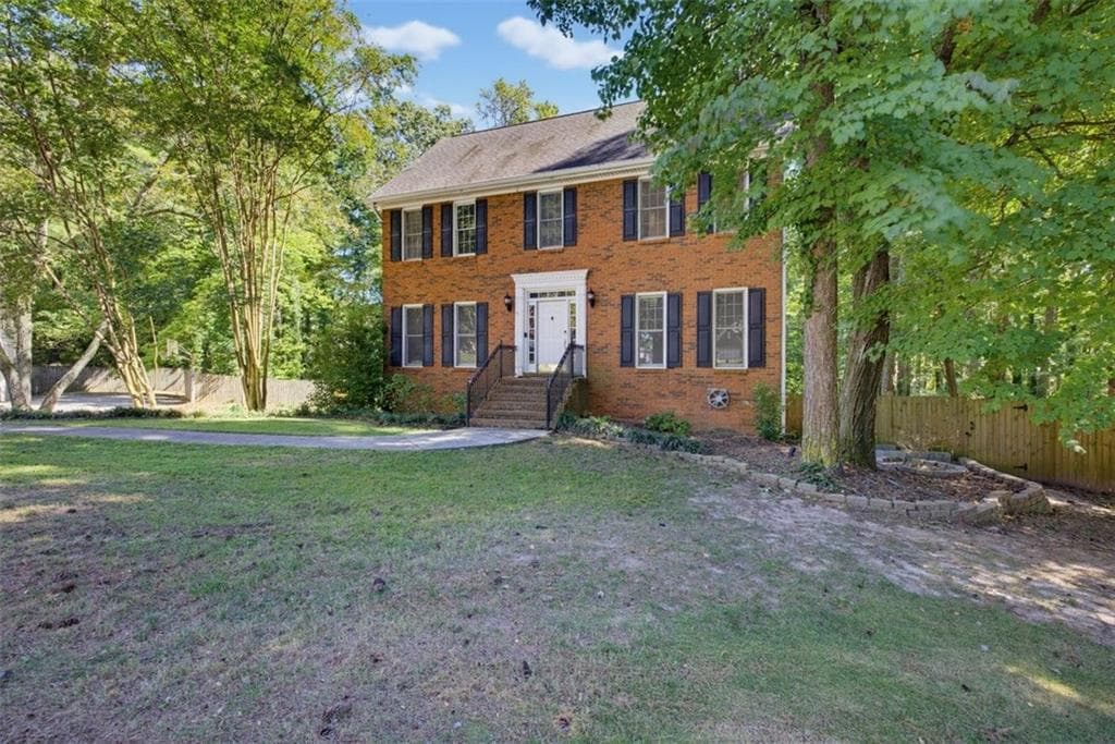 4 bedroom, 3 bathroom, 2,966 sq ft single family residence for sale at 2711 Lochraven Court, Snellville, GA 30039 — photo 2