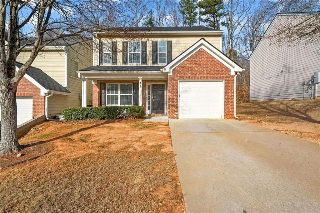 4 bedroom, 3 bathroom, 1,848 sq ft single family residence for sale at 4406 Ravenwood Drive, Union City, GA 30291 — photo 1 of 28