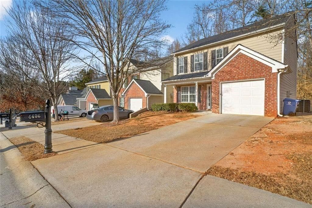 4 bedroom, 3 bathroom, 1,848 sq ft single family residence for sale at 4406 Ravenwood Drive, Union City, GA 30291 — photo 2