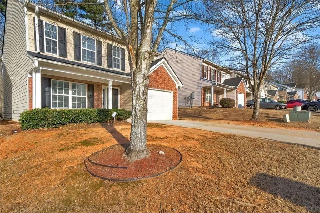 4 bedroom, 3 bathroom, 1,848 sq ft single family residence for sale at 4406 Ravenwood Drive, Union City, GA 30291 — photo 3