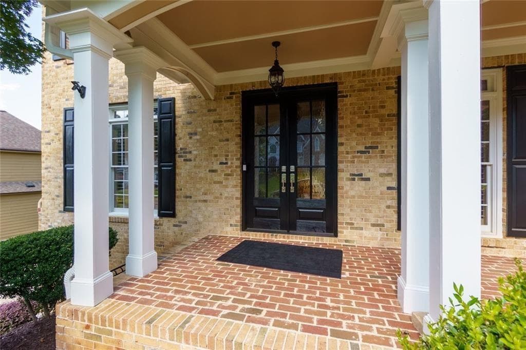6 bedroom, 5 bathroom, 6,897 sq ft single family residence for sale at 211 Cedar Woods Way, Canton, GA 30114 — photo 2