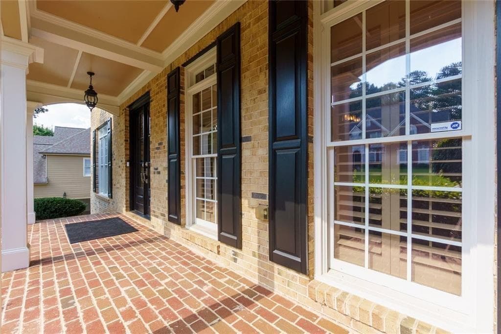 6 bedroom, 5 bathroom, 6,897 sq ft single family residence for sale at 211 Cedar Woods Way, Canton, GA 30114 — photo 3