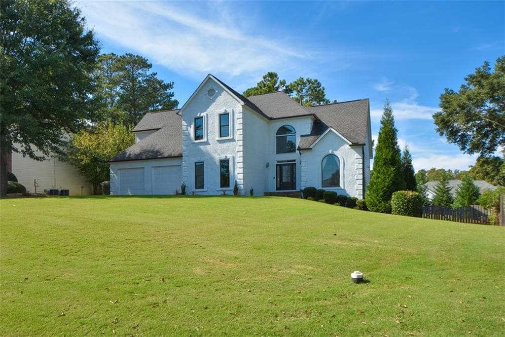 5 bedroom, 4 bathroom, 3,587 sq ft single family residence for sale at 10590 Stonepoint Place, Johns Creek, GA 30097 — photo 7