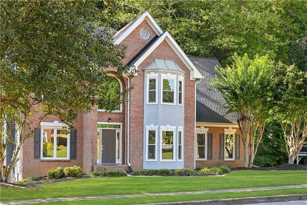 5 bedroom, 4 bathroom, 2,600 sq ft single family residence for sale at 5532 Snowy Orchid Drive, Sugar Hill, GA 30518 — photo 2