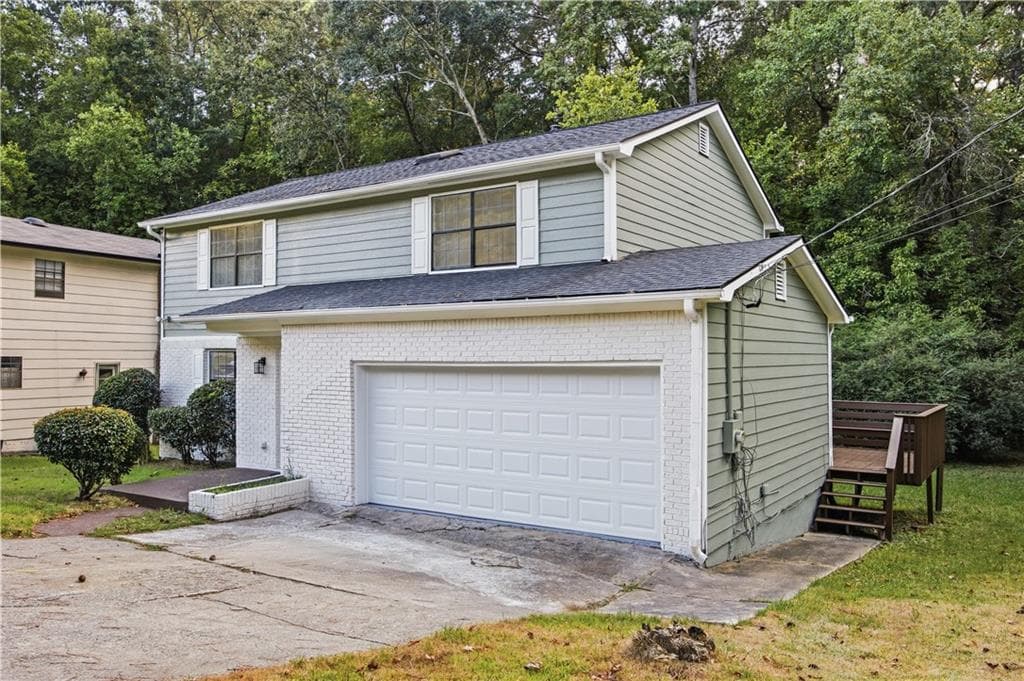 4 bedroom, 3 bathroom, 1,780 sq ft single family residence for sale at 3615 Satellite Boulevard, Ellenwood, GA 30294 — photo 2