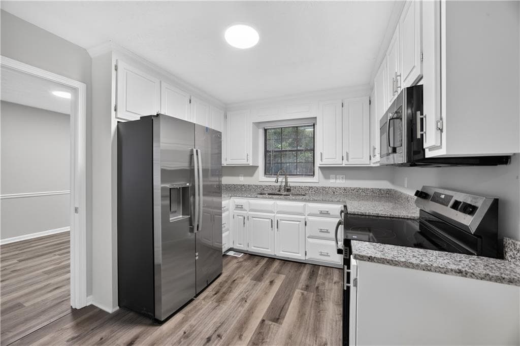 4 bedroom, 3 bathroom, 1,780 sq ft single family residence for sale at 3615 Satellite Boulevard, Ellenwood, GA 30294 — photo 8