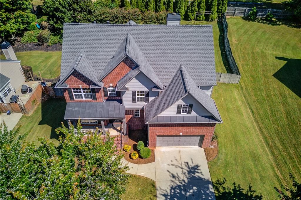 5 bedroom, 4 bathroom, 3,535 sq ft single family residence for sale at 3671 Devenwood Way, Buford, GA 30519 — photo 3