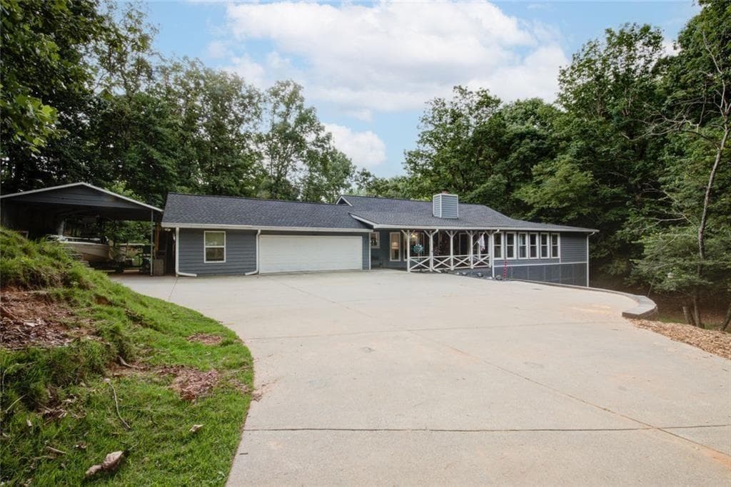 5 bedroom, 4 bathroom, 4,384 sq ft single family residence for sale at 7480 Shadburn Ferry Road, Cumming, GA 30041 — photo 1 of 67