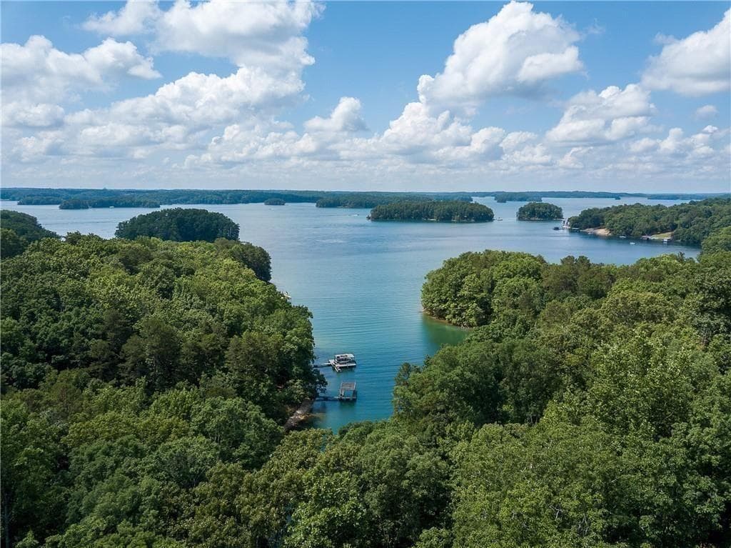 5 bedroom, 4 bathroom, 4,384 sq ft single family residence for sale at 7480 Shadburn Ferry Road, Cumming, GA 30041 — photo 4