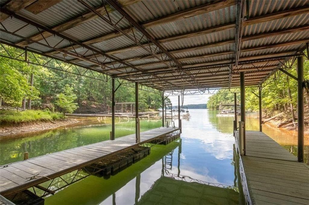 5 bedroom, 4 bathroom, 4,384 sq ft single family residence for sale at 7480 Shadburn Ferry Road, Cumming, GA 30041 — photo 6