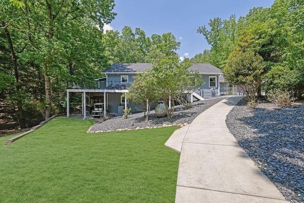 5 bedroom, 4 bathroom, 4,384 sq ft single family residence for sale at 7480 Shadburn Ferry Road, Cumming, GA 30041 — photo 7
