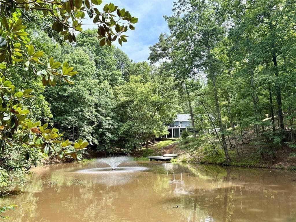 5 bedroom, 4 bathroom, 4,384 sq ft single family residence for sale at 7480 Shadburn Ferry Road, Cumming, GA 30041 — photo 8