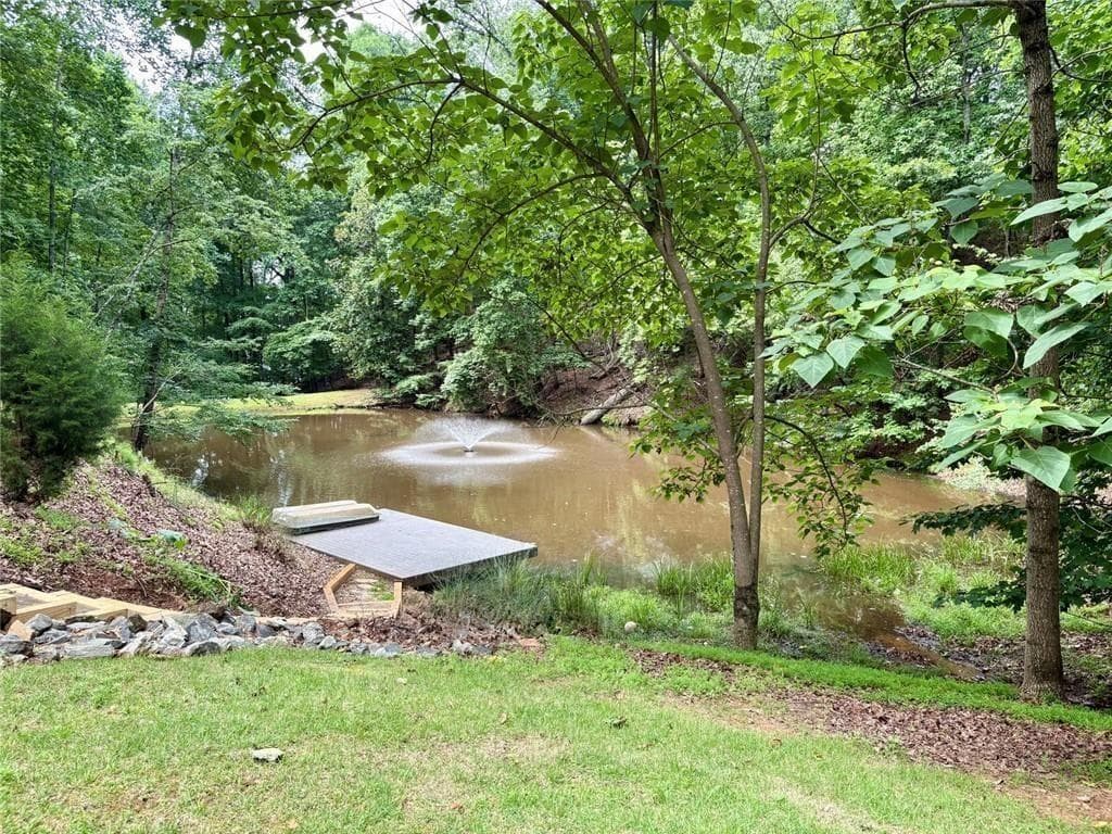 5 bedroom, 4 bathroom, 4,384 sq ft single family residence for sale at 7480 Shadburn Ferry Road, Cumming, GA 30041 — photo 9